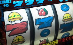 Filipino player placing a sports bet on jili jackpot mobile app during a basketball game